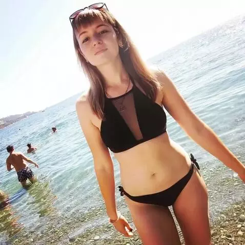 AI Video from prompt: she approaches us with the gait of a model, the 