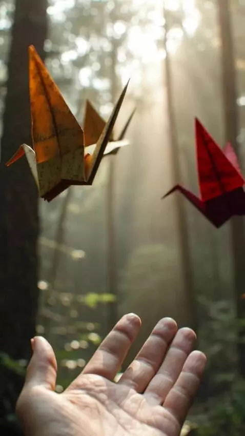 AI Video from prompt: Origami birds fly together in the sky, like swee