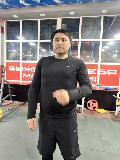 AI Video from prompt: Make him muscular, and have him working out his 