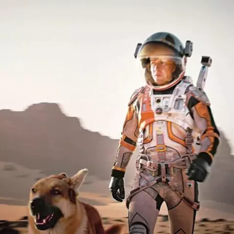 AI Video from prompt: This Guy in a spacesuit walking with his red Ger