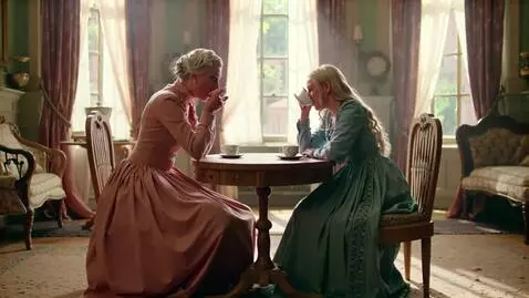 AI Video from prompt: An old lady and young women in an old beautiful 