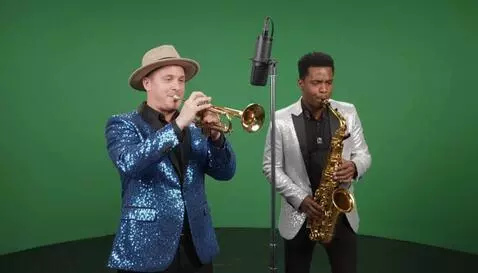 AI Video from prompt: A brass section play in unison , there is a trum