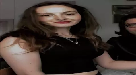 AI Video from prompt: She take off her shirt