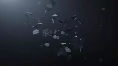 AI Video from prompt: Scattered pieces of metal, pieces of charcoal sc