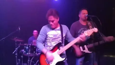 AI Video from prompt: Cool band playing guitar