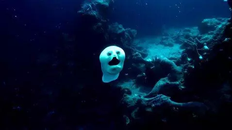 AI Video from prompt: Begin underwater in the dark, mysterious depths 