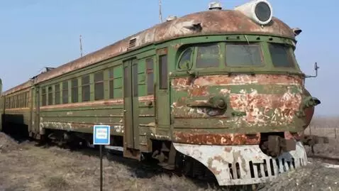 AI Video from prompt: a rusty Soviet electric locomotive without glass