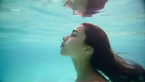 AI Video from prompt: Woman swimming