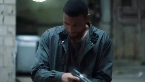 AI Video from prompt: Gun in guys hand