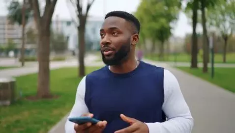 AI Video from prompt: Man playing on phone