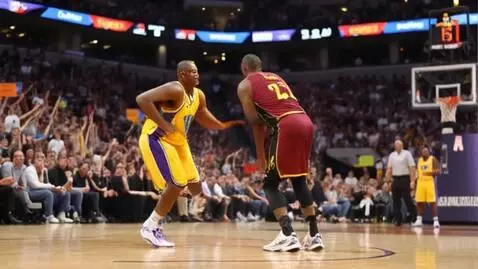 AI Video from prompt: Kobe Bryant as a black mamba dunking on Lebron J