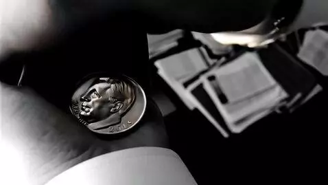 AI Video from prompt: The extreme close-up of a vintage 1950s U.S. dim
