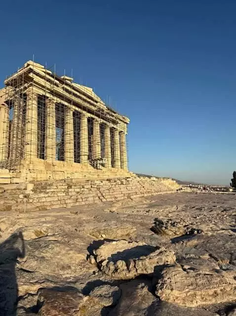 AI Video from prompt: The acropolis magically rebuilds itself