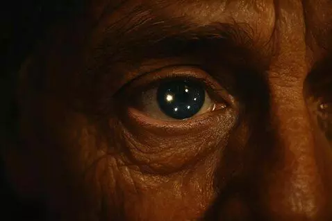 AI Video from prompt: Extreme close-up on human eye, camera holds perf
