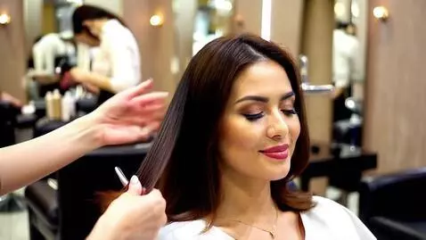 AI Video from prompt: Lady getting hair done