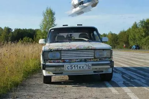 AI Video from prompt: the actomobile turns into a spaceship, takes off