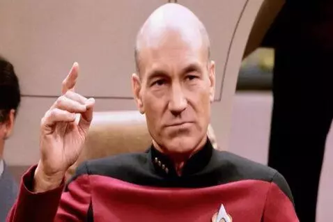 AI Video from prompt: Captain Piccard doing the sing of the cross