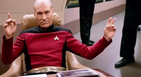 AI Video from prompt: Captain Piccard doing the catholic sing of the c