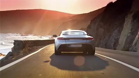 AI Video from prompt: An elegant sports car driving along a winding co
