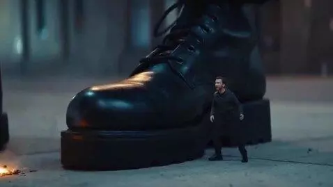 AI Video from prompt: The scene shows a man throwing a molotov cocktai