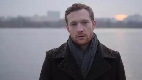 AI Video from prompt: a man stands in front of the camera and says "go