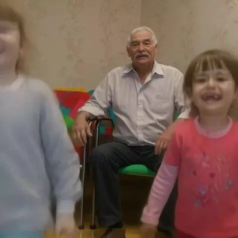 AI Video from prompt: Two girls run away quickly, leaving Grandpa sitt
