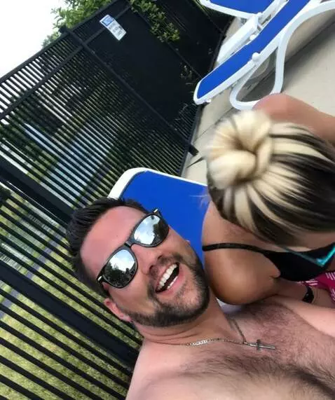 AI Video from prompt: Have the woman lean her head down to the man's l