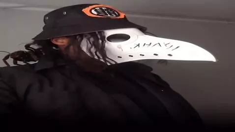 AI Video from prompt: A large black tarantula crawls over the shoulder