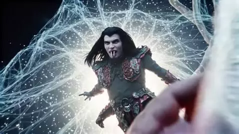 AI Video from prompt: a vampire man with long black hair, two fangs, l