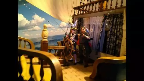 AI Video from prompt: Two pirates are on the deck of a ship, a young c