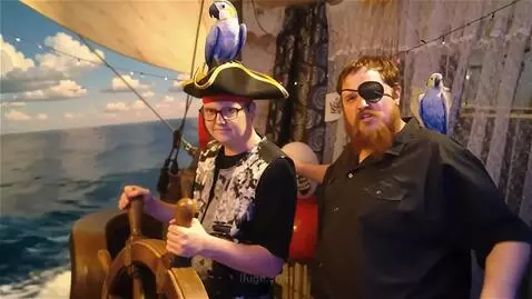 AI Video from prompt: Two pirates are on the deck of a ship, a young c