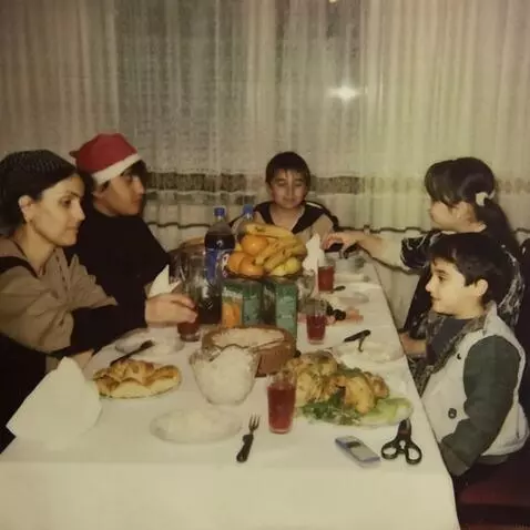 AI Video from prompt: Bring the people in the picture to life so they 