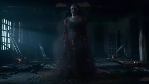 AI Video from prompt: The ashes turn into a nun with burnt robe. In a 