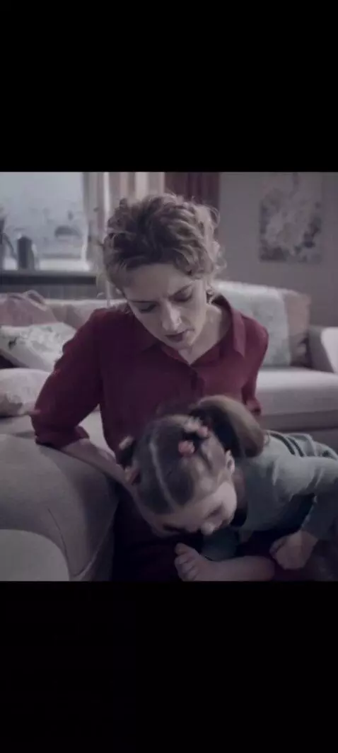 AI Video from prompt: The girl's stomach twisted violently. She's curl