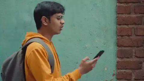 AI Video from prompt: Scene 1: (Chotu is walking while looking at his 