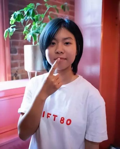 AI Video from prompt: She puts a finger in her mouth