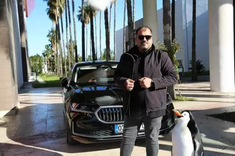 AI Video from prompt: A cinematic winter scene where the man in the im