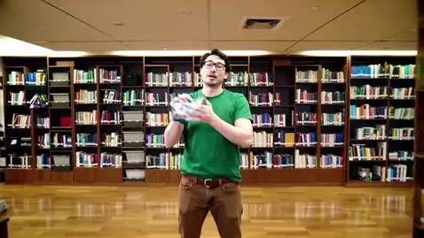 AI Video from prompt: General shot of a man wearing glasses with dark 