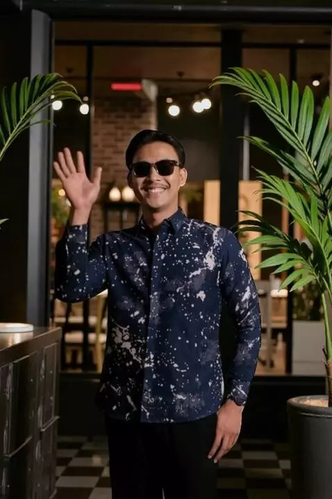 AI Video from prompt: this man waved and smiled