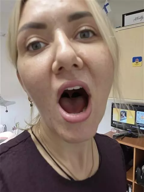AI Video from prompt: the camera zooms in very close to the mouth, whi