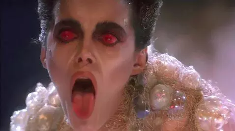 AI Video from prompt: Looking at viewer mouth wide open sticking tongu