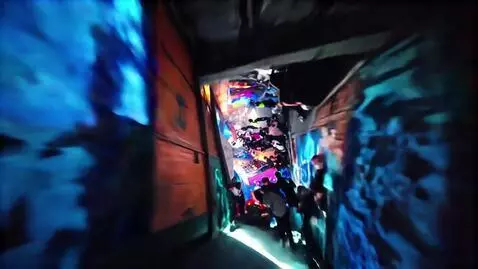 AI Video from prompt: Camera accelerates through shifting nightclub en