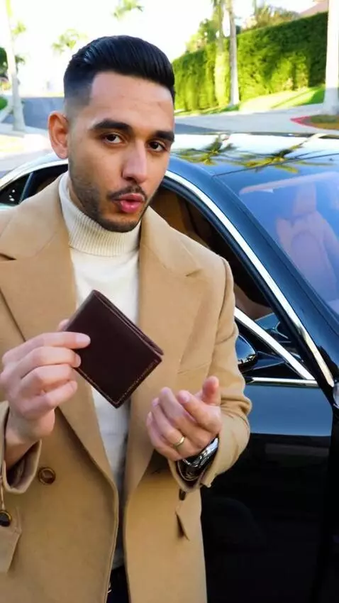 AI Video from prompt: man with a lavish car holding and showcasing the