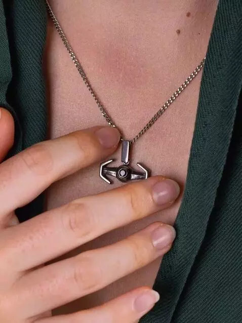 AI Video from prompt: The girl raises her hand, carefully shows the pe