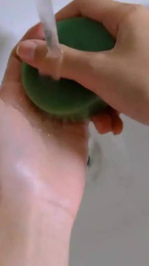 AI Video from prompt: Close-up vertical video of a bidara herbal soap 