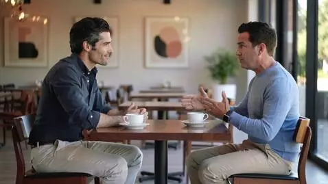 AI Video from prompt: A confident bilingual sales closer in his 30s, s