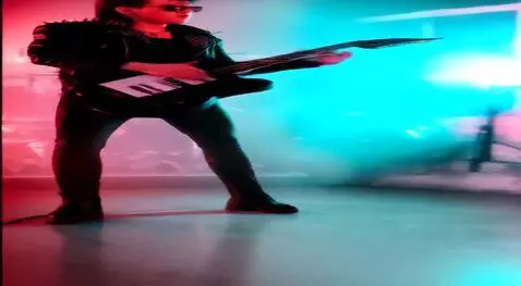 AI Video from prompt: the man dance with guitar
