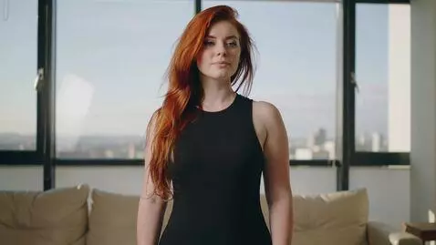 AI Video from prompt: Redhead woman, busty, slim body