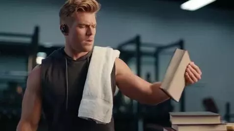 AI Video from prompt: picture a dumb gym-goer who becomes smart and ge