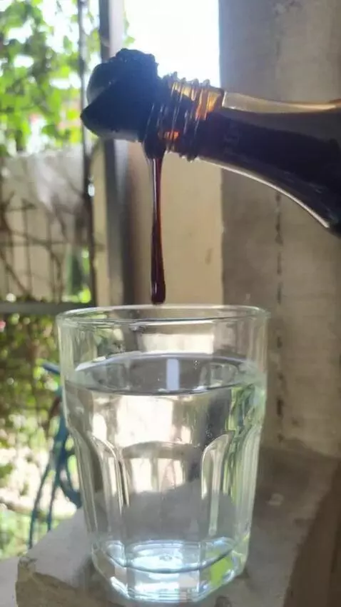 AI Video from prompt: A glass jar of forest acacia honey is gently ope